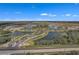 Community entrance with ponds and landscaping at 2417 Waterfront Cir, Sarasota, FL 34240