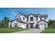Two-story home with gray roof, white siding, and a two-car garage at 2508 Waterfront Cir, Sarasota, FL 34240