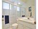 Bathroom featuring a glass enclosed shower and a vanity with a mirror and ample lighting at 2737 Harvest Dr, Sarasota, FL 34240
