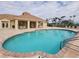 Large community pool with a brick paver deck and a spacious clubhouse, ideal for summer fun at 2737 Harvest Dr, Sarasota, FL 34240