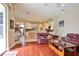Open floor plan showcasing the living room, kitchen, and dining nook, promoting connectivity at 2737 Harvest Dr, Sarasota, FL 34240