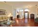 Spacious living room featuring hardwood floors, elegant decor, and an open layout with plenty of natural light at 2737 Harvest Dr, Sarasota, FL 34240