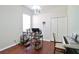 Office space with hardwood floors, a window for natural light, and functional desk space at 2737 Harvest Dr, Sarasota, FL 34240