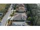 Aerial view of a house featuring solar panels and a screened-in pool at 3439 101St E Ave, Parrish, FL 34219