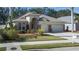 Charming home with a manicured front yard and a two car garage at 3439 101St E Ave, Parrish, FL 34219
