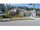 Charming home with a manicured front yard and a two car garage at 3439 101St E Ave, Parrish, FL 34219