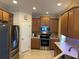 Well-equipped kitchen with stainless steel appliances and ample cabinet space for modern living at 3439 101St E Ave, Parrish, FL 34219