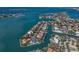Breathtaking aerial view showcasing a coastal community with waterfront homes, private boat docks and scenic waterways at 367 W Royal Flamingo Dr, Sarasota, FL 34236