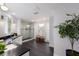 Bright bathroom with double vanity, glass-enclosed shower and plantation shutters at 367 W Royal Flamingo Dr, Sarasota, FL 34236