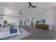 Expansive main bedroom featuring a four-poster bed, hardwood floors, and plenty of space at 367 W Royal Flamingo Dr, Sarasota, FL 34236