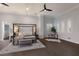 Modern bedroom featuring hardwood floors, sitting area, and natural light at 367 W Royal Flamingo Dr, Sarasota, FL 34236