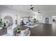 Spacious bedroom features a four-poster bed, hardwood floors, and ample natural light at 367 W Royal Flamingo Dr, Sarasota, FL 34236