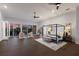 Spacious bedroom with sunset views, seating area, and stylish four-poster bed at 367 W Royal Flamingo Dr, Sarasota, FL 34236