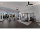 Generous bedroom showcasing hardwood floors, a four-poster bed, and windows with bright, natural light at 367 W Royal Flamingo Dr, Sarasota, FL 34236