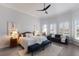 Spacious bedroom with decorative pillows, and natural light from large windows at 367 W Royal Flamingo Dr, Sarasota, FL 34236
