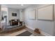 Stylish bonus room area with accent rug, a yoga mat, and calming decor at 367 W Royal Flamingo Dr, Sarasota, FL 34236