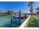 Waterfront dock with boat lift and scenic canal views at 367 W Royal Flamingo Dr, Sarasota, FL 34236