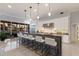 Bright kitchen featuring a large island, stainless steel appliances, and stylish pendant lighting at 367 W Royal Flamingo Dr, Sarasota, FL 34236