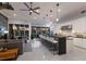 Bright and airy living area with barstool seating, modern appliances, and serene views at 367 W Royal Flamingo Dr, Sarasota, FL 34236