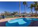 Beautiful pool with a spa, palm trees, and waterfront views creating a perfect backyard oasis at 367 W Royal Flamingo Dr, Sarasota, FL 34236