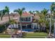 Luxury waterfront home boasting a private pool, lush landscaping, and a private boat dock at 367 W Royal Flamingo Dr, Sarasota, FL 34236