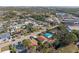 Neighborhood overview with various homes and streets visible at 4704 Town N Country Blvd, Tampa, FL 33615