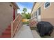Backyard with stairs, patio, and covered grill at 4704 Town N Country Blvd, Tampa, FL 33615