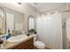 Clean bathroom with shower/tub combo and updated vanity at 4704 Town N Country Blvd, Tampa, FL 33615