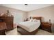 Bedroom with wood bed frame and ample storage at 4704 Town N Country Blvd, Tampa, FL 33615