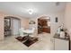 Dining room with white table and chairs near kitchen at 4704 Town N Country Blvd, Tampa, FL 33615