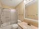 Clean bathroom with shower/tub combo, vanity with countertop, and a mirror at 5607 Garden Lakes Majestic, Bradenton, FL 34203