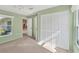 Bedroom with neutral walls, carpet flooring, and built-in closet at 5607 Garden Lakes Majestic, Bradenton, FL 34203