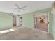 Bright bedroom with mirrored closet doors and carpet flooring at 5607 Garden Lakes Majestic, Bradenton, FL 34203