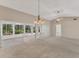 Spacious living area with a view of the backyard at 5607 Garden Lakes Majestic, Bradenton, FL 34203