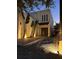Modern home featuring a flat roof, a sleek white exterior, and minimalist landscaping at 5906 Larchwood Ave, Sarasota, FL 34231