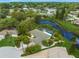 Aerial view of house and property with canal at 6308 Lilac Pl, Sarasota, FL 34231