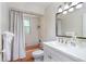 Bathroom with a tub, toilet, and vanity at 6308 Lilac Pl, Sarasota, FL 34231