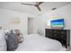 Comfortable bedroom with king-size bed and large dresser at 6308 Lilac Pl, Sarasota, FL 34231