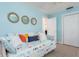 Bedroom with daybed and colorful pillows at 6308 Lilac Pl, Sarasota, FL 34231