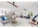 Bright and airy living room with open floor plan and modern furniture at 6308 Lilac Pl, Sarasota, FL 34231