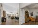 Spacious living area with wood floors, dining area, and comfortable seating creates an open and inviting atmosphere at 7207 Oak Moss Dr # 63, Sarasota, FL 34241
