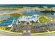 Aerial view of a community clubhouse featuring a pool, tennis courts, lush landscaping and ample parking at 9244 Ballaster Pointe Loop, Parrish, FL 34219