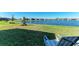 Enjoy this home's beautiful lake view from the backyard, perfect for relaxing and entertaining guests at 9244 Ballaster Pointe Loop, Parrish, FL 34219