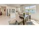 Bright kitchen and dining area featuring stainless steel appliances at 9244 Ballaster Pointe Loop, Parrish, FL 34219
