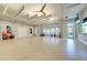Spacious fitness studio with natural lighting, ceiling fans, and exercise equipment for community workouts at 9244 Ballaster Pointe Loop, Parrish, FL 34219