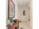Bright foyer featuring a wooden console table and artwork at 9244 Ballaster Pointe Loop, Parrish, FL 34219