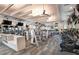 A spacious community gym featuring modern exercise equipment, weights, and TVs for an optimal workout experience at 9244 Ballaster Pointe Loop, Parrish, FL 34219