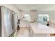 Modern kitchen with stainless steel appliances and white cabinetry at 9244 Ballaster Pointe Loop, Parrish, FL 34219