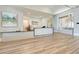 Modern reception area featuring a stylish desk, water feature, and contemporary artwork in a welcoming atmosphere at 9244 Ballaster Pointe Loop, Parrish, FL 34219