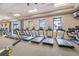Bright fitness center with modern treadmills and views of the community at 10379 Medjool Dr, Venice, FL 34293